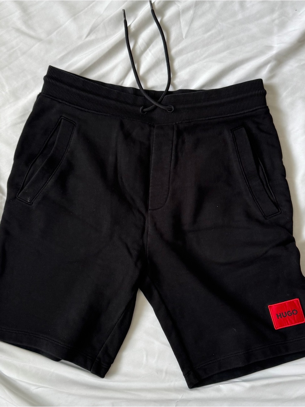 HUGO Black Athletic Shorts with Red Logo Patch